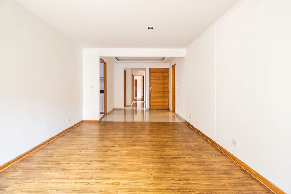 Empty cleaned flat with a wooden floor, ready to be handed over